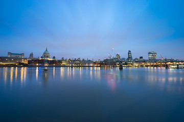 Fototapeta na wymiar Panorama of London,Southwark bridge and St.Paul's cathedral viewed at sunrise