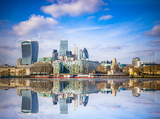 Skyscrapers in financial district with reflection in London. England