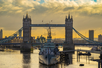 Tower Bridge viewed across the river Thames sunrise sky in London. England