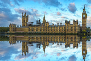 Fototapeta na wymiar Big Ben and Westminster Bridge with colorful sky and reflection, London, UK