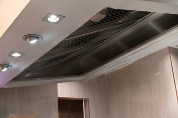 Exhaust hood and ventilation for teppanyaki kitchen restaurant.