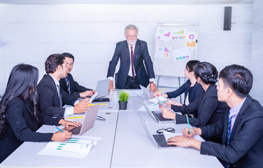 group of successful businessman. Discussion of the business profits of the company.