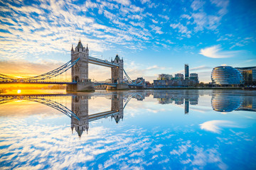 Naklejka premium Tower bridge at sunrise with reflection in London,England