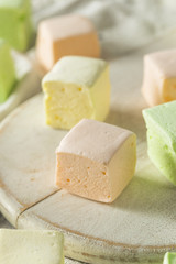 Fototapeta na wymiar Homemade Square Fruity Colorful Marshmallows