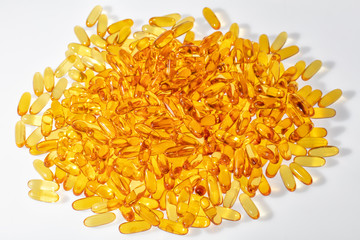 Vitamin e. Fish oil capsules on white background. Copy space for your text, high resolution product.