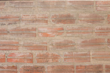 The surface markings of a brick wall blocks.
