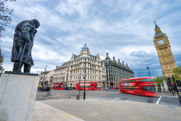 George street square with double decker buses in motion