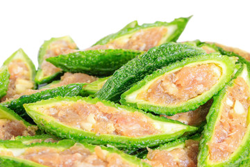 Close up bitter gourd pile with stuffed hack pork and garlic black pepper ingredient. vegetable herb Nourish the health body. Thai food