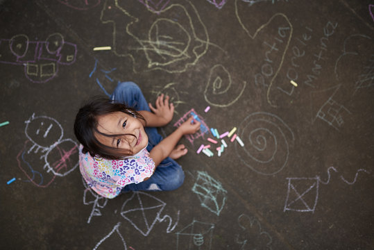 Asian small girl with chalk