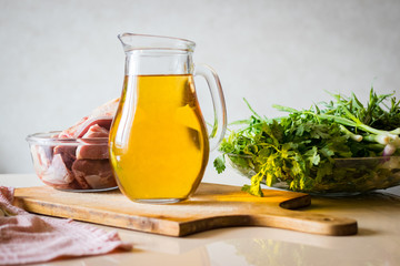 Full glass jug, pitcher or jar of white Georgian or Italian wine.
