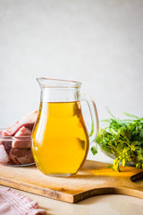 Full glass jug, pitcher or jar of white Georgian or Italian wine.