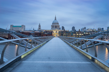  Millennium bridge and St.Paul's cathedral viewed at sunrise in London, England