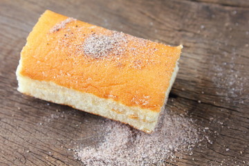 fresh sweet homemade delicious cake on wooden background