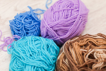 colorful threads for Knitting. close up of colorful yarn wool, a lot of balls. Knitting yarn for handmade winter clothes