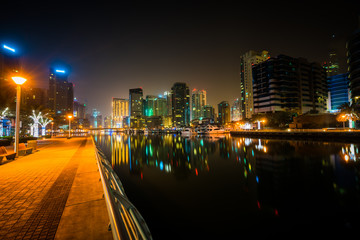 Fototapeta na wymiar Dubai marina illuminated at night in United Arab Emirates 