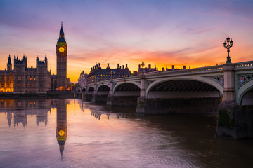 Big Ben with water reflection at beautiful sunset