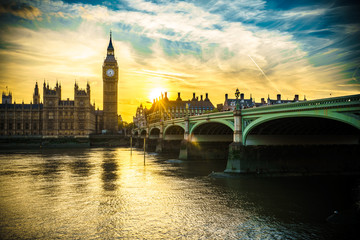 Obraz na płótnie Canvas Big Ben with sun flare at sunset in London,UK