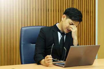 Asian businessmen have stress at work