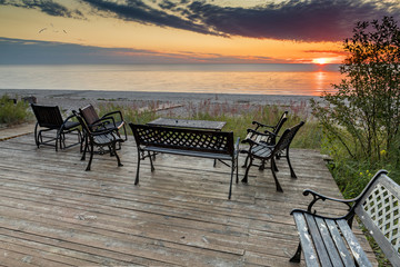 Coastal landscape at colorful dawn, sandy beach of the Baltic Sea