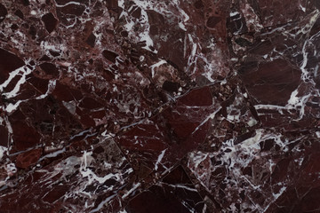 The red marble. Texture.