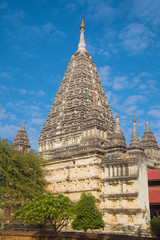 Fototapeta na wymiar The central part of the ancient Buddhist temple Mahabodhi Paya close-up. Bagan, Myanmar (Burma)