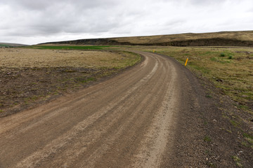 Fototapeta na wymiar Empty icelandic countryside gravel road in Iceland
