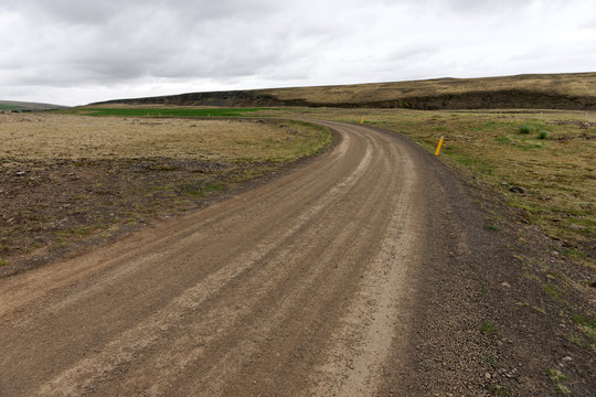Empty icelandic countryside gravel road in Iceland