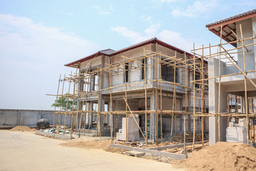 house under construction with autoclaved aerated concrete block structure at building site