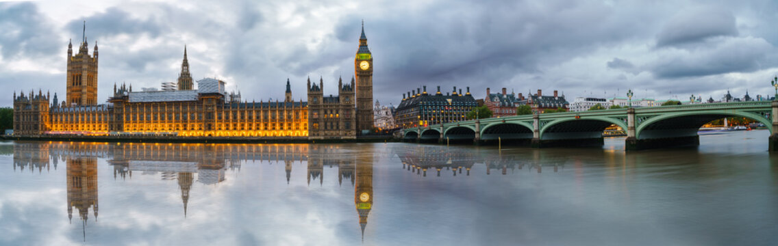 Panoramic picture of Houses of Parliament, Big Ben and Westminster Bridge with reflection, London