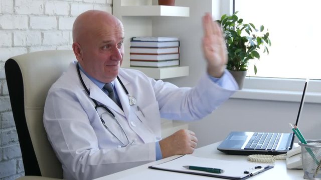Doctor Image Smiling and Making Stop Hand Gesture In Medical Cabinet
