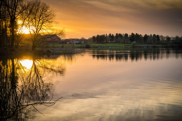 Fototapeta na wymiar Lake at sunset in autumn