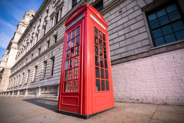 Fototapeta na wymiar Close up view of Red telephone box in London