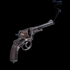 military revolver on black background