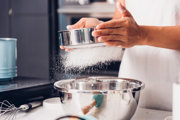 Woman girl in kitchen cooking baker bakery powder dough