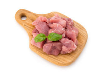 Raw chopped beef meat pieces isolated om white background cut out.