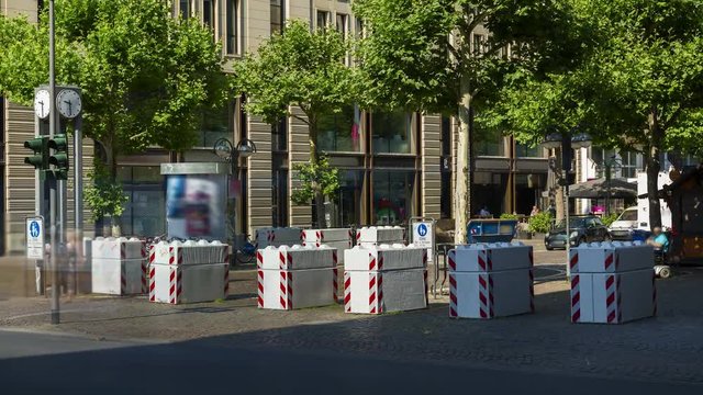Frankfurt Germany, June 28th 2018, concrete bollards blocks at the beginning of the Grosse Bockenheimer Strasse, Fressgass, to protect from terror attacks, time lapse