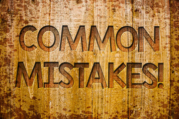 Conceptual hand writing showing Common Mistakes Motivational Call. Business photo showcasing lot of people do same action in wrong way Wooden background wood colour beautiful templates message.