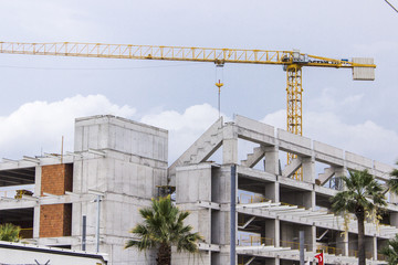 Perspective shot of reinforced construction site of soccer stadium with over cast sky in Izmir at Turkey