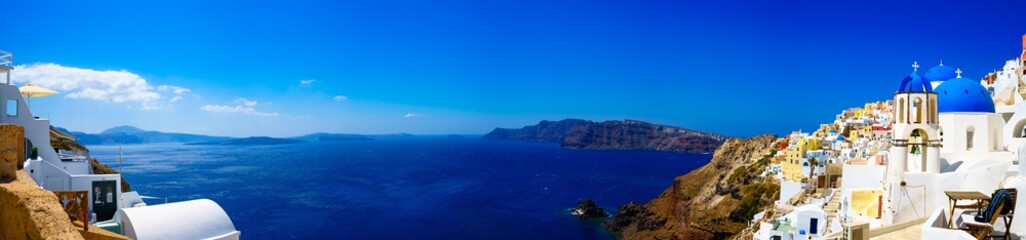 Panorama of Oia. Blue domes  and aegean sea.Santorini.Greece