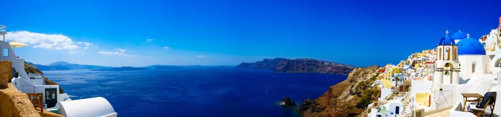 Poster Panorama of Oia. Blue domes  and aegean sea.Santorini.Greece © Pawel Pajor