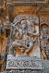 Sculpture of dancing Shiva, west side walls, Hoysaleshwara temple, Halebidu, Karnataka. view from West.