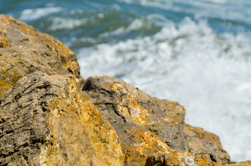 Amazing sea with blue summer wave and rocks, relaxing view of rocks and water
