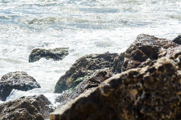 Amazing sea with blue summer wave and rocks, relaxing view of rocks and water