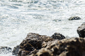 Amazing sea with blue summer wave and rocks, relaxing view of rocks and water