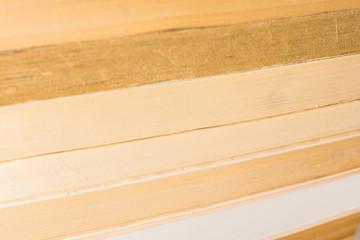 Many stacked books with white background with space