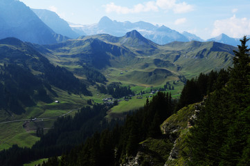 Fototapeta na wymiar Swiss alps: mountain landscape, lush green hills in Adelboden/Silleren, Bernese Oberland