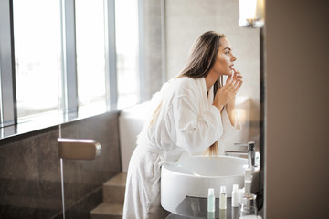 Pretty woman in the bathroom