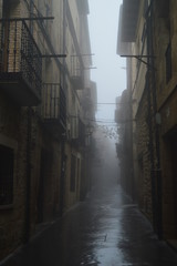 Beautiful Streets Very Narrow In A Very Cloudy Day In Laguardia. Architecture, Art, History, Travel. December 26, 2015. La Guardia, Alava, Basque Country, Spain.