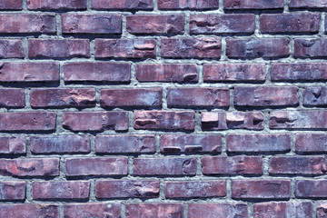 texture close-up of a colored brick wall, background image