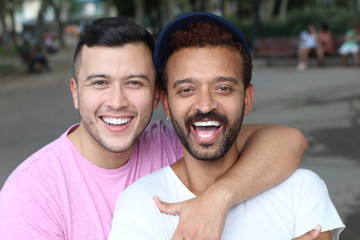 Multiethnic gay couple in the park